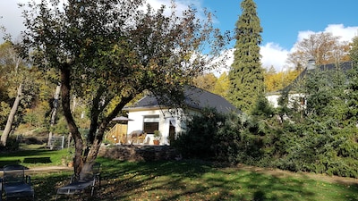 House with private terrace, large garden and playground next to the forest