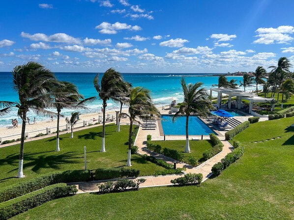 View of Pools, Palms & Sea from Villa