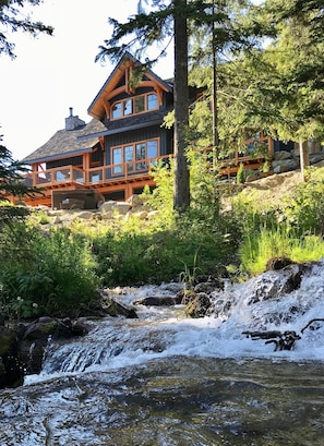 The rushing creek off the back of the home giving the home it's name - summer &