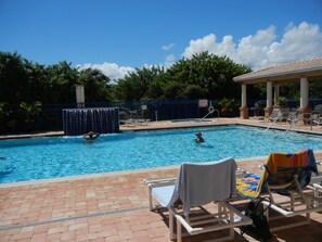 Relax by one of two luxury pools with clubhouse, spa, gym, flat screen.