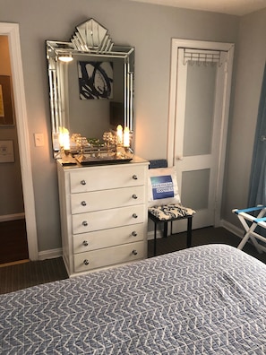Art deco mirror and chest of drawers.