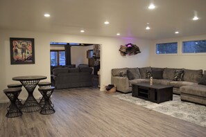 Large family room with game table