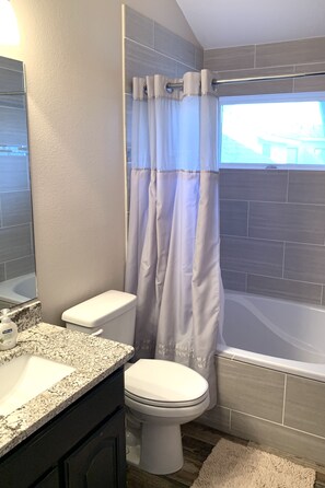 Upstairs bathroom with large garden tub.