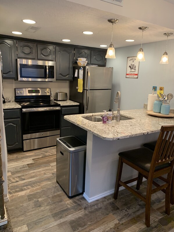 Kitchen that is stocked with everything you need for your stay.