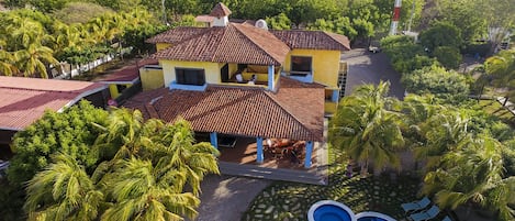 Aerial view of house and pool