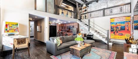 Welcome to the Penthouse 2 BR/ 2 BA two story loft with large living space 