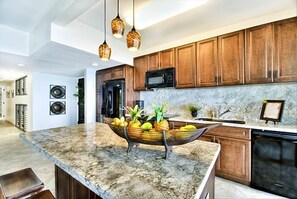 This is a Designer Kitchen from "Top to Bottom", open to the Lanai