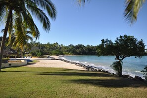 View from the north side of property looking south to our beach, and high tide