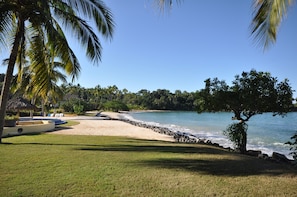 View from the north side of property looking south to our beach, and high tide