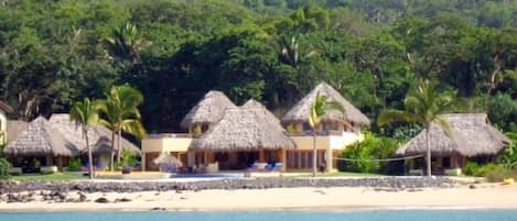 Las Palapas main building and 2 casitas.  200 feet of beach front.