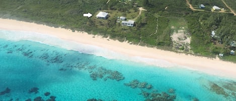 Aerial View - Atlantic Sunrise beachfront home on a spectacular and pristine pink sand beach