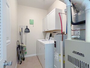 Utility Room w/ Washer & Dryer