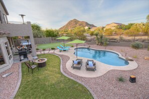 Resort amenities including heated pool, hot tub, putting green, fire pit and dazzling views make this home a premium retreat for large or multiple families.