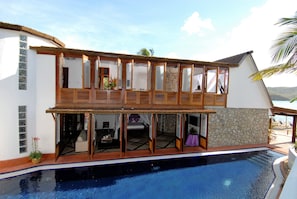 Side view of Beach House and private swimming pool