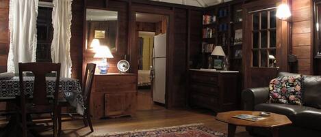 Dining area to the left and enclosed porch out the door to the right. 