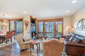 Living room with leather queen sleeper sofa