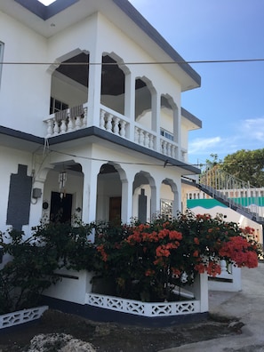 Gorgeous Bougainvillea surrounds the front entrance.