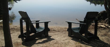 Your own private natural sand beach, with hammock, picnic table, and kayaks.