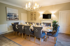 The dining table seats a maximum of 10
