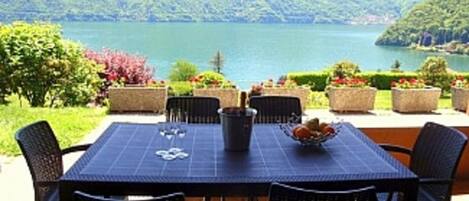 
"Apartment Bella Vista In Mezzegra" alfresco dining with 180 degree views