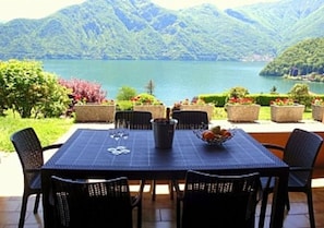
"Apartment Bella Vista In Mezzegra" alfresco dining with 180 degree views