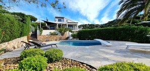 Pool and villa in the back