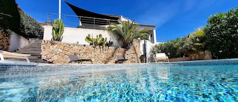 Pool and villa in the back