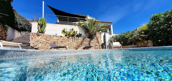 Pool and villa in the back