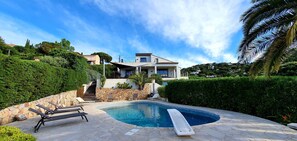 Pool and villa in the back