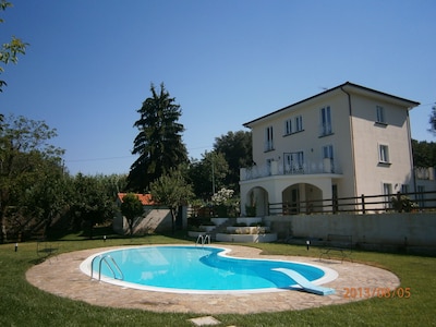 Villa Don Agostino with swimming pool surrounded by greenery