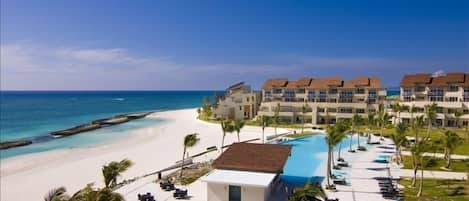 Swimming pool and private beach