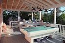 Enjoy a game of pool or table tennis in the new billiard porch