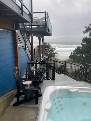 Hot tub many jets, waterfall feature and view of ocean. Enjoy outdoor speakers.