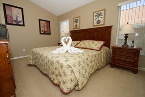 En-suite #1 with King size bed, 32"HDTV and direct access to pool deck