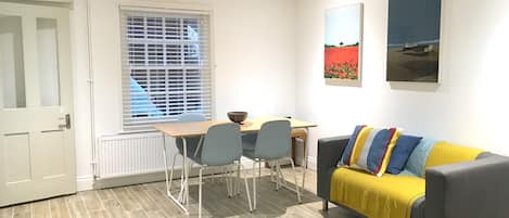 Airy sitting and dining room.