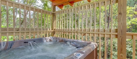 Luxuriate In The Hot Tub - The jets of steamy water are sure to relax your muscles after a day spent exploring the Great Smoky Mountains! 