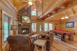 So Much To Love - The wood-planked walls and floors, the cathedral ceiling, and the rustic furnishings make Lovers' Hideaway a delightful home base for your Smoky Mountain vacation. 