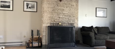 Fireplace between living room and Kitchen 