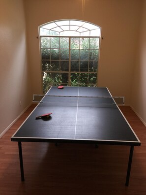 Ping Pong table; can be moved outside to the patio (weather permitting)