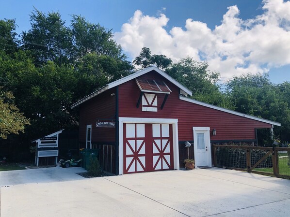 There's a parking pad to the left of the barn for easy access to the entry.