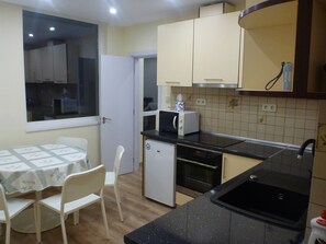 Kitchen dining room with balcony