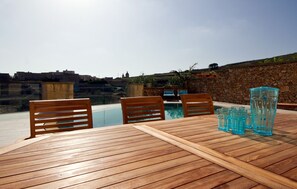 Alfresco dining on the outdoor deck area