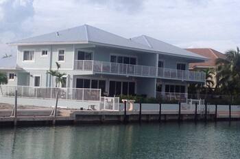 Canal front with Pool & 50 feet of Dock on each side / Cabana Club Included!