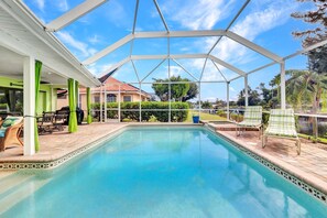 Large Heated Pool in Winter months with a Canal view to watch boats pass by.