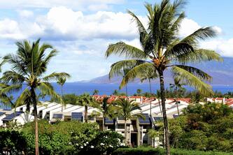 Upgraded unit with Panoramic Ocean and Mountain Views