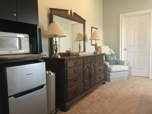 Microwave & fridge/freezer combo. Large dresser and walk-in closet