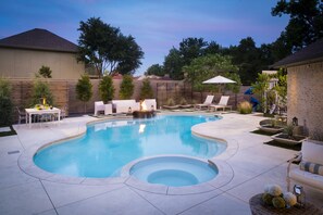 View of backyard from sitting area by the house
