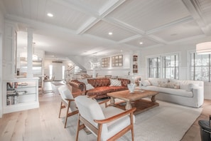 living area, view towards dining & entry