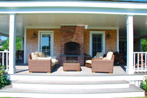 View to outside living area and fireplace