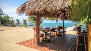 Private bar great for dinner and drinks or escaping the sun, right on the beach